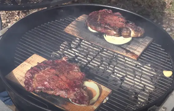 This image is showing how to smoke using Alder plank .