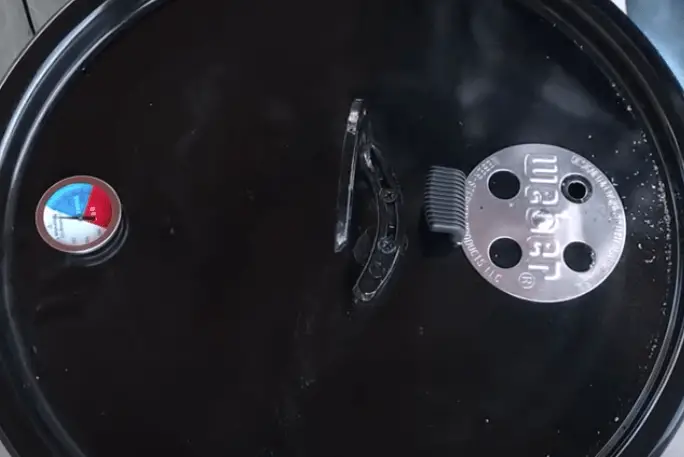 Image of the thermometer and damper once installed