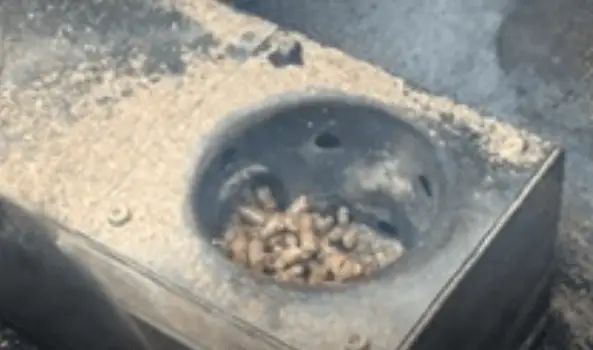 The Pit Boss auger feeds the pellets into the fire pot.